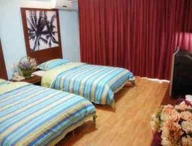 Xinlong Holiday Hotel Jiaozhou Exteriör bild